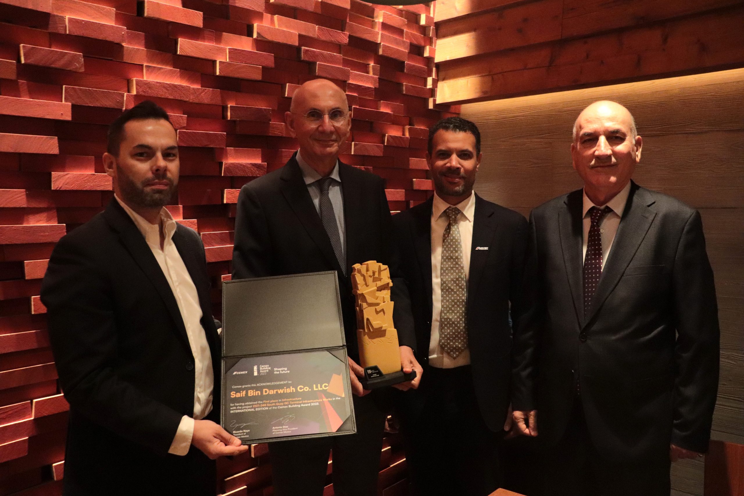Adnan Naji SBD COO receiving the award from Rafael Villalona CEMEX Country Director Also, Mariusz Mlodawski CEMEX Commercial Technical Director and Faik Jameel SBD Senior Project Manager for "2101- 248 South Quay GC Terminal Infrastructure Works” Project.